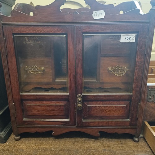 752 - A walnut smokers cabinet, 40 cm wide, an oak wall cabinet, and a stationery box (3)