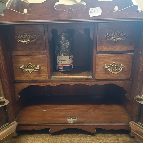 752 - A walnut smokers cabinet, 40 cm wide, an oak wall cabinet, and a stationery box (3)