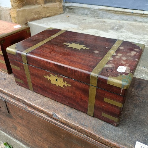 786 - An oak coffer of plank construction, in very poor order, 113 cm wide, a camphorwood and brass bound ... 