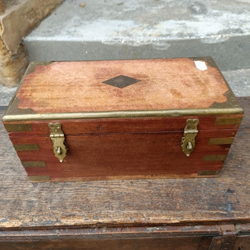 786 - An oak coffer of plank construction, in very poor order, 113 cm wide, a camphorwood and brass bound ... 