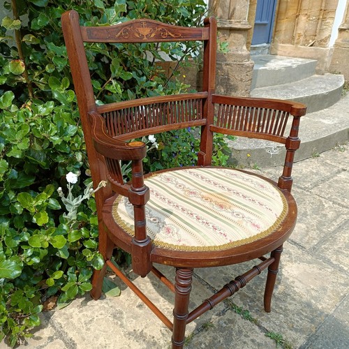 801 - An early 20th century mahogany framed armchair