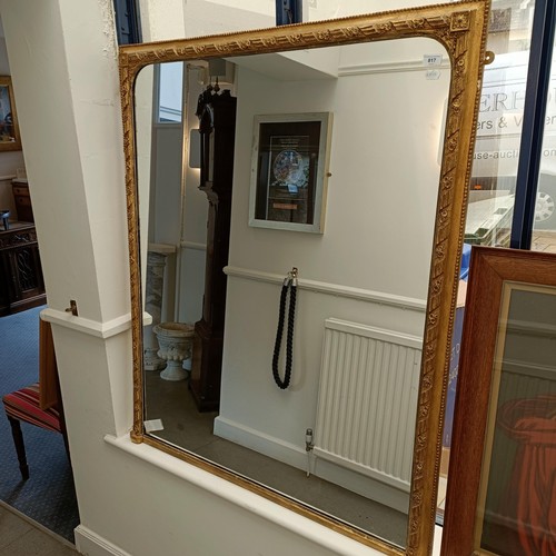 817 - A gilt framed overmantel mirror, 125 x 107 cm