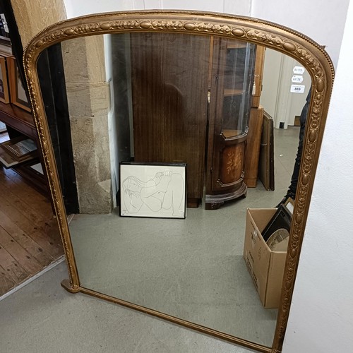 869 - A gilt gesso overmantel mirror, 190 x 149 cm