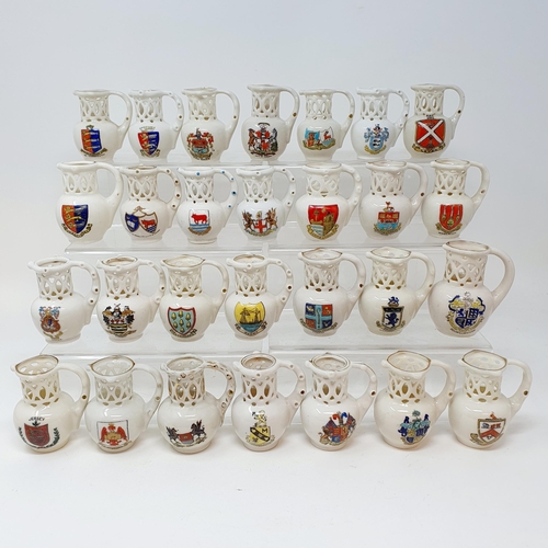 564 - Assorted crested ware of puzzle jugs (2 boxes)