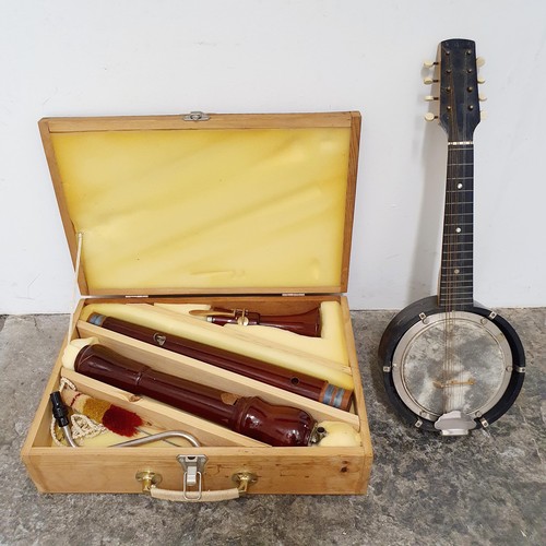 721 - A bass recorder, and a banjo (2)