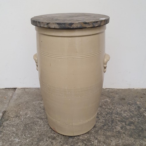 731 - A stoneware water barrel, with a later top, 52 cm high