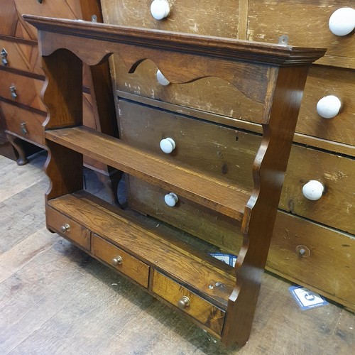 785 - A vintage tool box, with assorted woodworking tools, and an oak wall shelf, with three small drawers... 