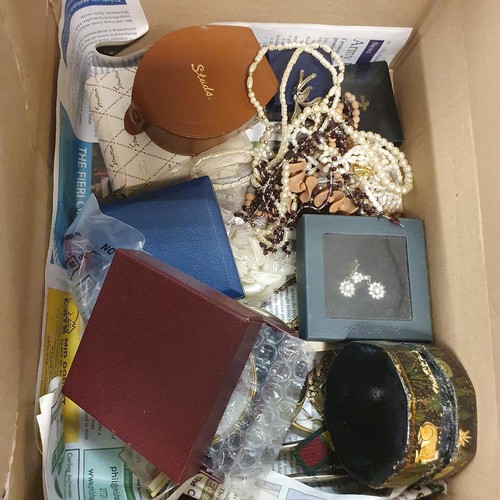 714 - A 1980s Rubix cube, boxed, a pair of child's leather shoes, and assorted other items (box)