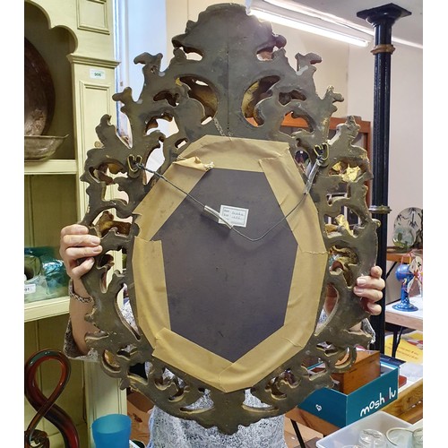 932 - A 19th century style gilt gesso wall mirror, 70 x 50 cm