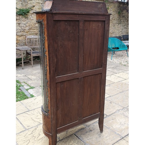 944 - A 19th century French serpentine front walnut display cabinet, with gilt metal mounts, 90 cm wide