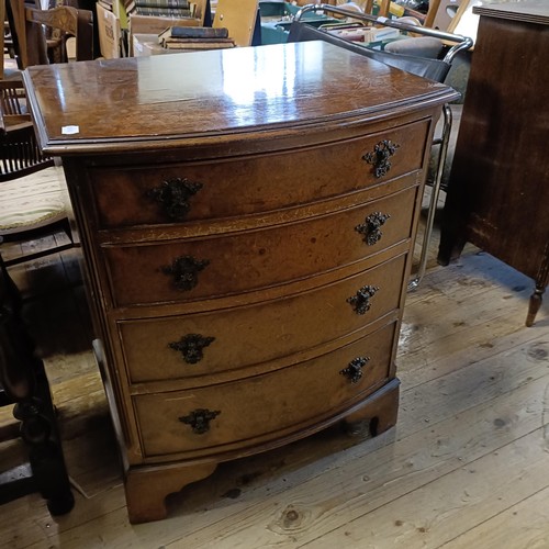 945 - A 20th century mahogany bachelors chest,  74 cm wide, two chest of drawers, an oak side table and co... 