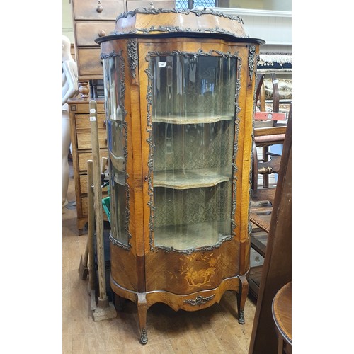 944 - A 19th century French serpentine front walnut display cabinet, with gilt metal mounts, 90 cm wide