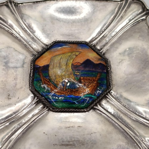 83 - A silver dish, of shaped rectangular form, the centre applied an octagonal plaque, decorated a ship,... 