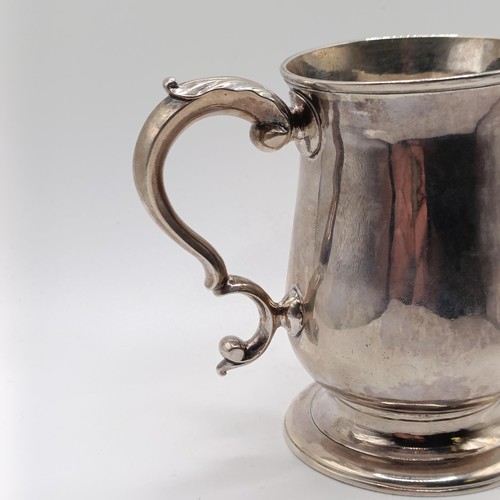 39 - A George III silver mug, of baluster form, makers mark IK, London 1744, 5.7 ozt, 9.5 cm high