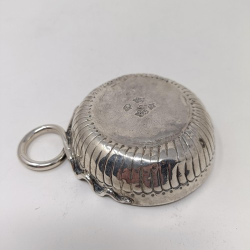 69 - An 18th century French silver wine taster, 2.5 ozt, 10.5 cm wide