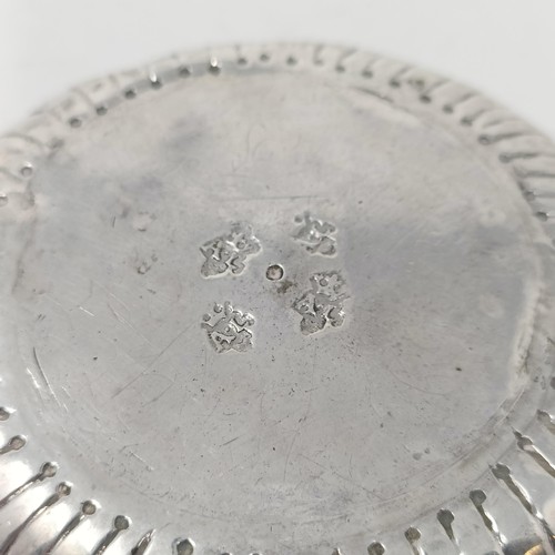 69 - An 18th century French silver wine taster, 2.5 ozt, 10.5 cm wide