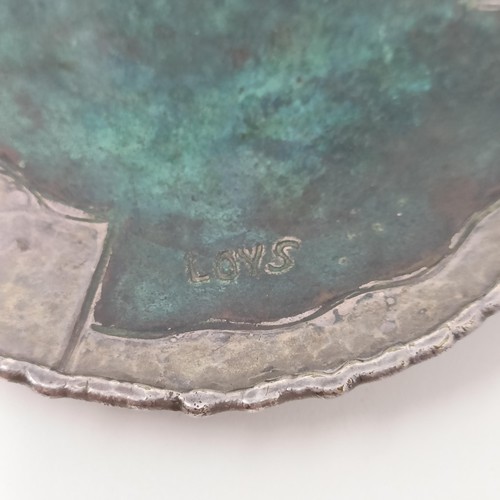 102 - A French silver coloured metal and enamel dish, with hammered decoration, 11.5 cm diameter