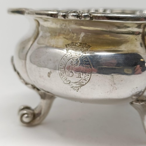 111 - An Edwardian silver salt, of good gauge, with a military type crest, Hunt & Roskell, London 1902, 5.... 