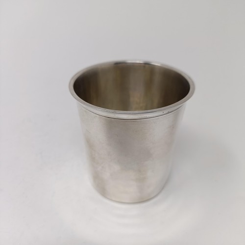 197 - An early 18th century provincial silver beaker, 7 cm high