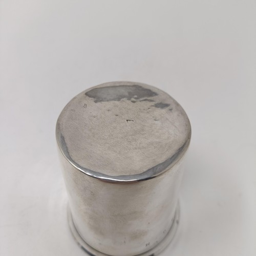 197 - An early 18th century provincial silver beaker, 7 cm high