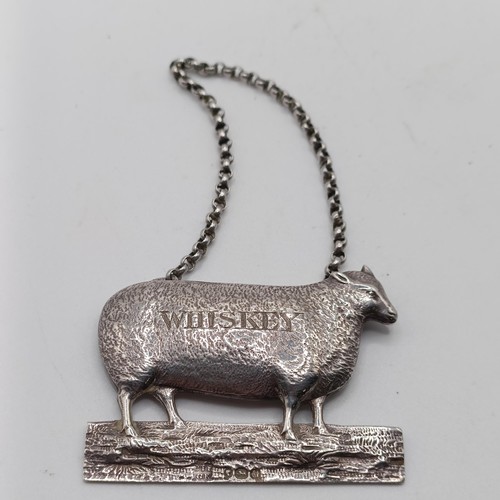 134 - A rare Victorian silver Whiskey decanter label, in the form of a sheep, London 1855, 5.5 cm wide