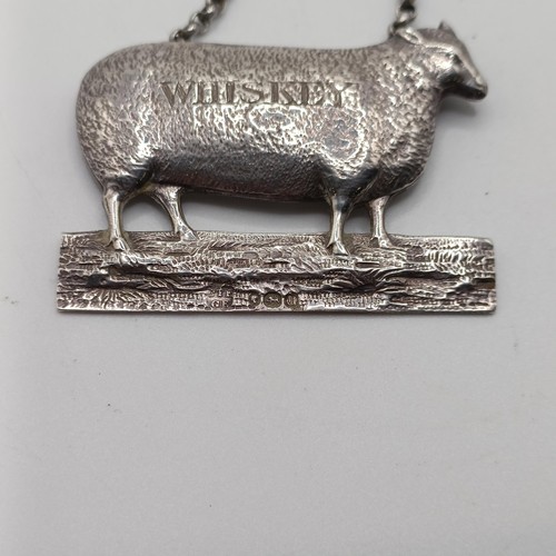 134 - A rare Victorian silver Whiskey decanter label, in the form of a sheep, London 1855, 5.5 cm wide