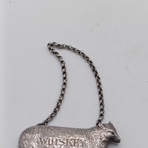 134 - A rare Victorian silver Whiskey decanter label, in the form of a sheep, London 1855, 5.5 cm wide