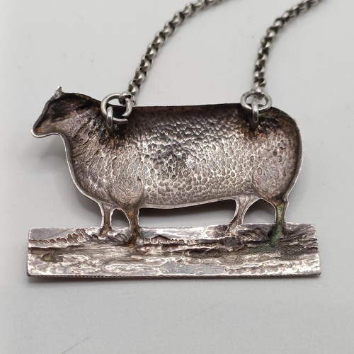 134 - A rare Victorian silver Whiskey decanter label, in the form of a sheep, London 1855, 5.5 cm wide