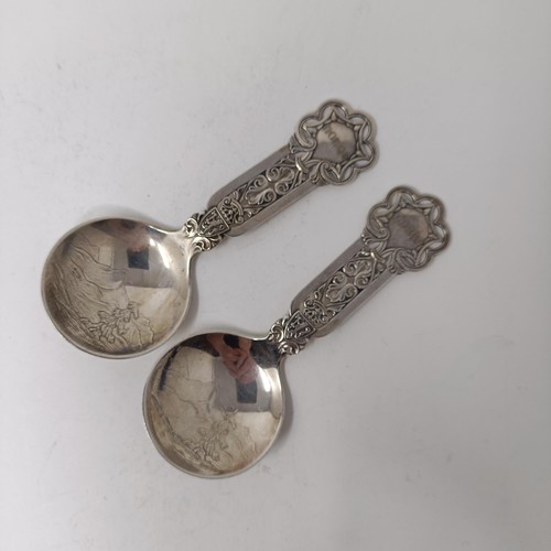 108 - A pair of Norwegian silver coloured metal caddy type spoons (2)