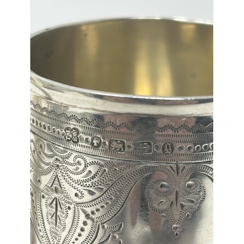 68 - A Victorian silver christening mug, Birmingham 1881, 3.9 ozt, 8 cm high