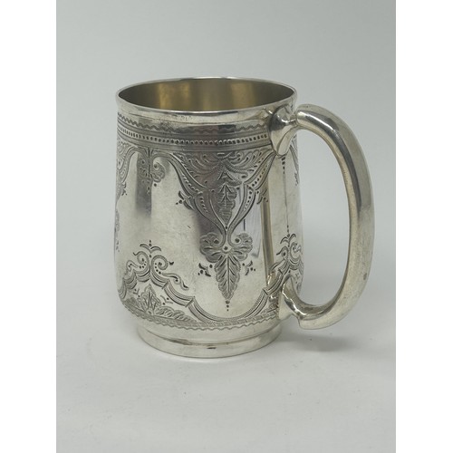 68 - A Victorian silver christening mug, Birmingham 1881, 3.9 ozt, 8 cm high