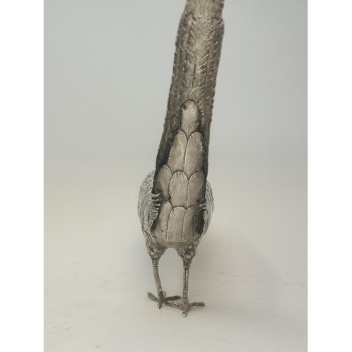 142 - A large and unusual decanter, in the form of a cock pheasant, import marks for London 1913, 33.3 ozt... 