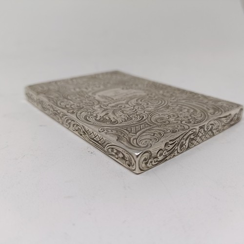 117 - A Victorian silver visiting card case, initialled, engraved a sailing boat and with acanthus leaf, 9... 