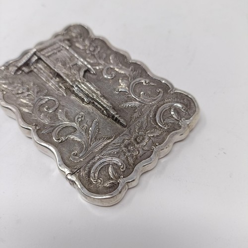 118 - A Victorian silver visiting card case, embossed Scots memorial, named, Birmingham 1850, 1.5 ozt, 9 c... 