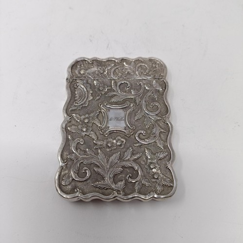 118 - A Victorian silver visiting card case, embossed Scots memorial, named, Birmingham 1850, 1.5 ozt, 9 c... 