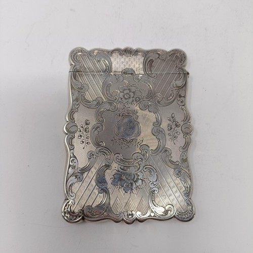 115 - An early Victorian silver visiting card case, initialled and engraved dwellings by a river, Birmingh... 