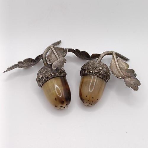 139 - A pair of silver and horn novelty acorn pepperettes, Sampson Morden & Co