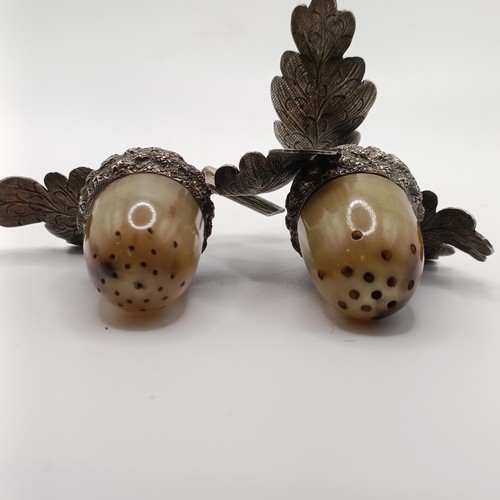 139 - A pair of silver and horn novelty acorn pepperettes, Sampson Morden & Co