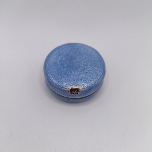 165 - A silver and enamel pillbox and cover, slight damage, 4 cm diameter