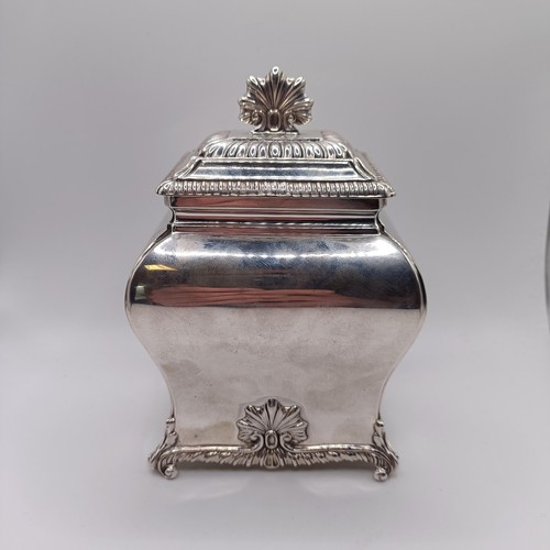 129 - A late Victorian silver tea caddy, of bombe form, decorated shells, West & Son, Dublin, London 1898,... 