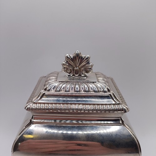 129 - A late Victorian silver tea caddy, of bombe form, decorated shells, West & Son, Dublin, London 1898,... 