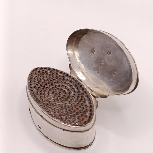 121 - A George III nutmeg grater, of navette form, initialled, London 1809, 1.4 ozt (all in), 5 cm wide