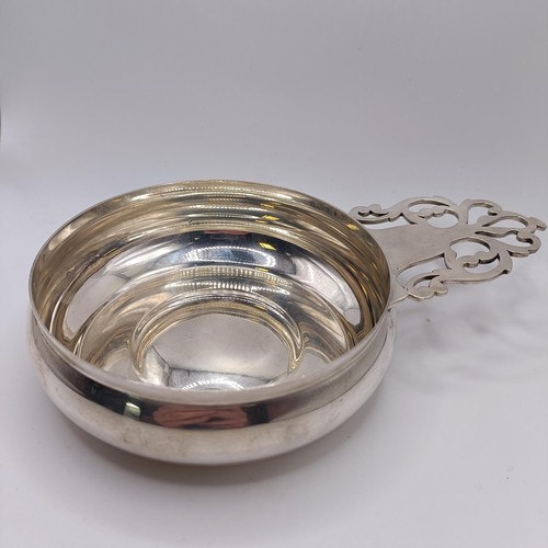 128 - A Tiffany sterling silver bleeding bowl/wine taster, being a reproduction after Paul Revere, 8 ozt, ... 