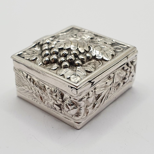 89 - A modern silver pill box, decorated grapes, 3 cm wide