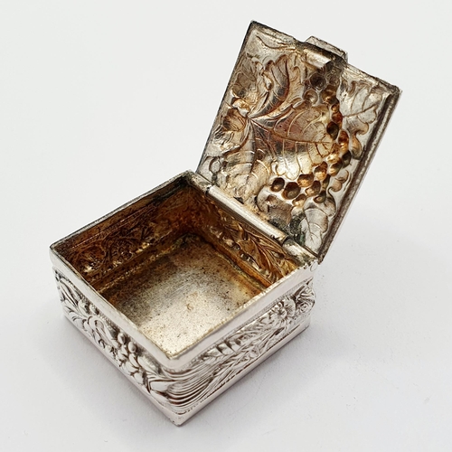 89 - A modern silver pill box, decorated grapes, 3 cm wide