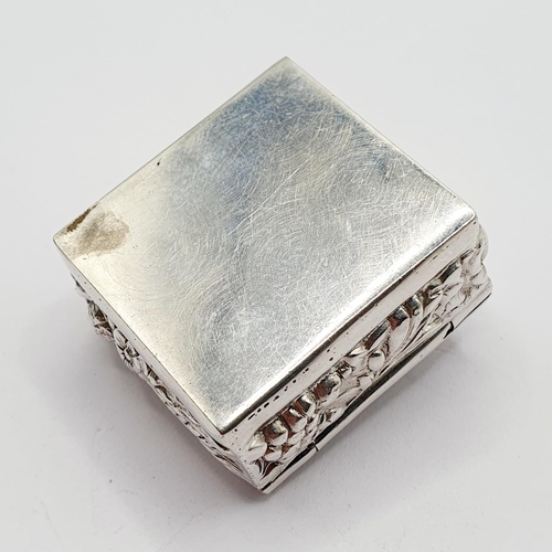 89 - A modern silver pill box, decorated grapes, 3 cm wide