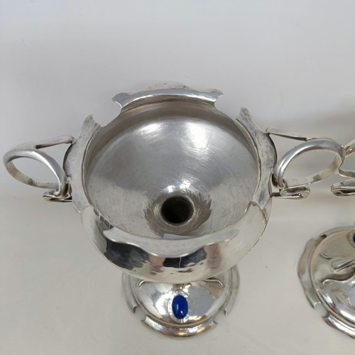 5 - A pair of Art Nouveau silver pedestal cups, applied blue cabochon stones, Mappin & Webb, Sheffield 1... 