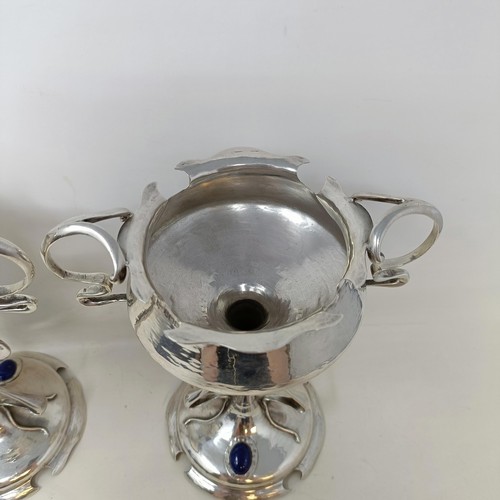 5 - A pair of Art Nouveau silver pedestal cups, applied blue cabochon stones, Mappin & Webb, Sheffield 1... 