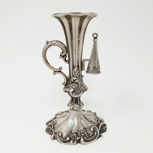 99 - An early 19th century silver taperstick, decorated foliage, with a snuffer, Sheffield 1839, 14 cm hi... 