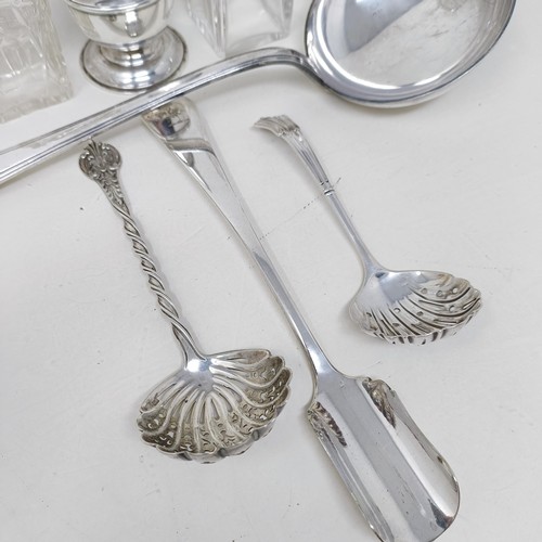 1 - A George V silver sugar sifter, two sifter spoons, various dates and marks, 5.8 ozt, a silver plated... 